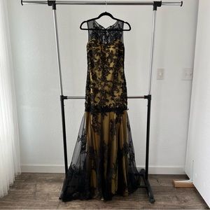 Yellow mermaid gown with black lace